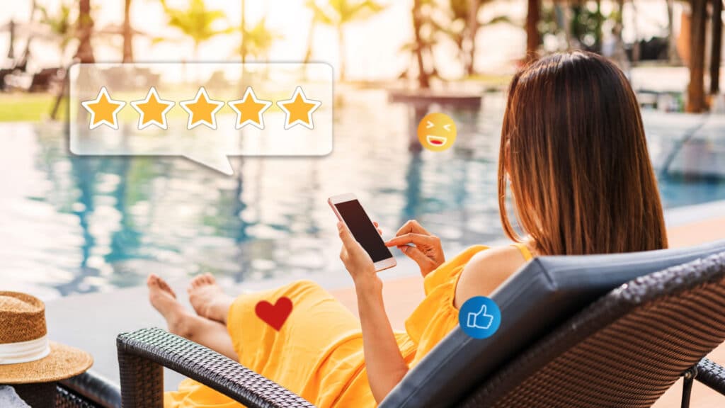 woman reviewing resort on social media